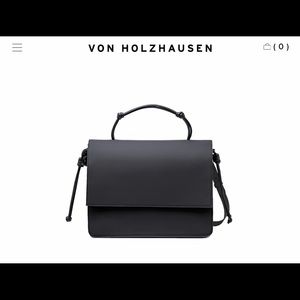 VON HOLZHAUSEN The Handheld